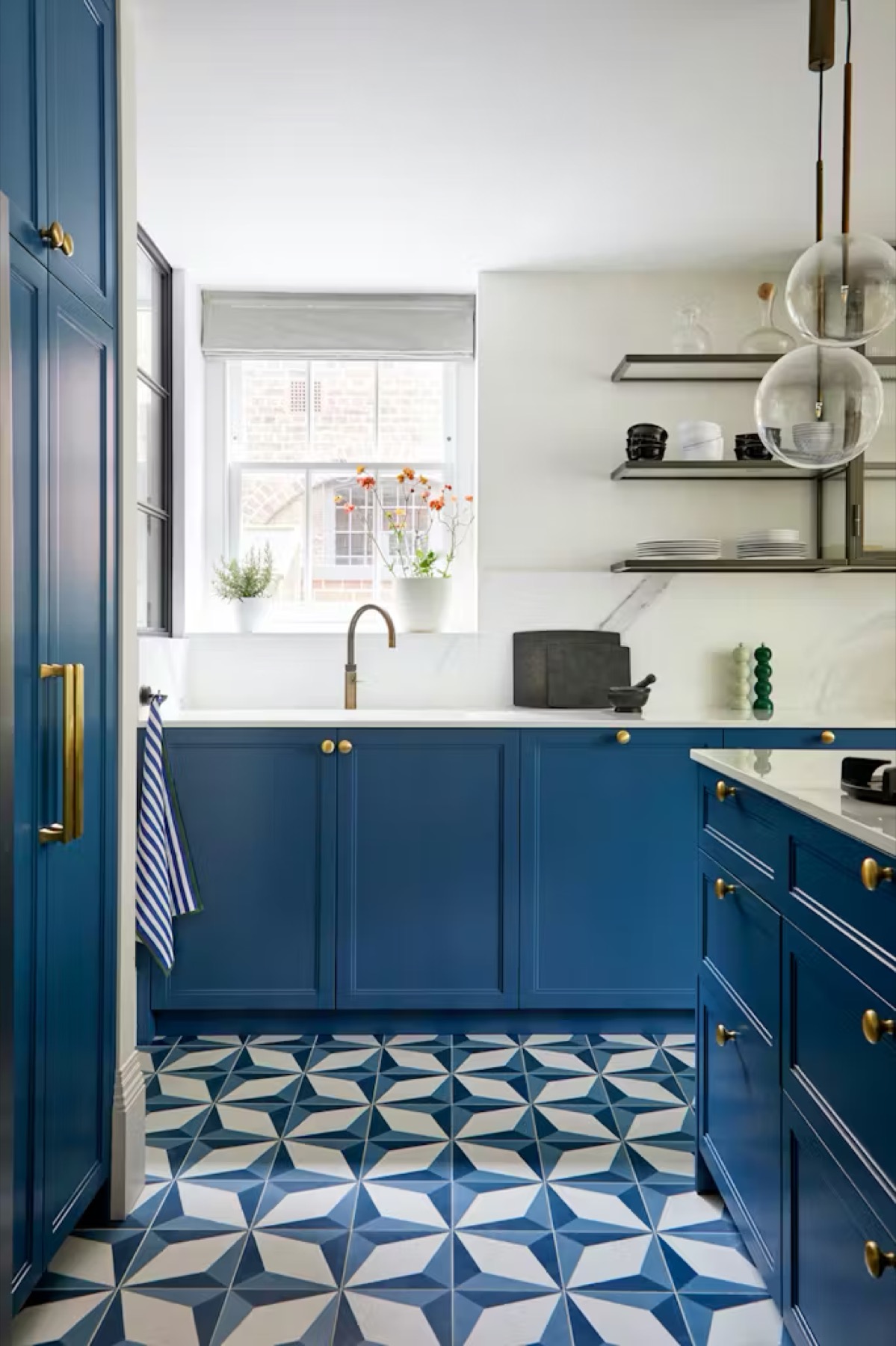 Eton Avenue — blue kitchen with geometric floor tiles