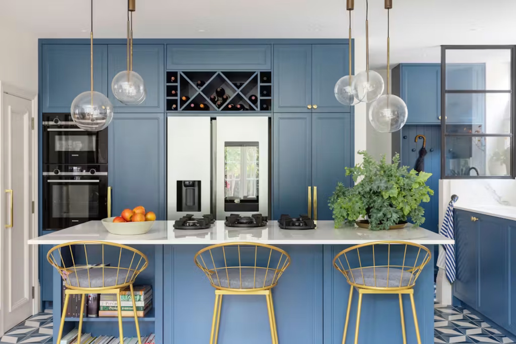 Eton Avenue — blue island with gold wire bar stools