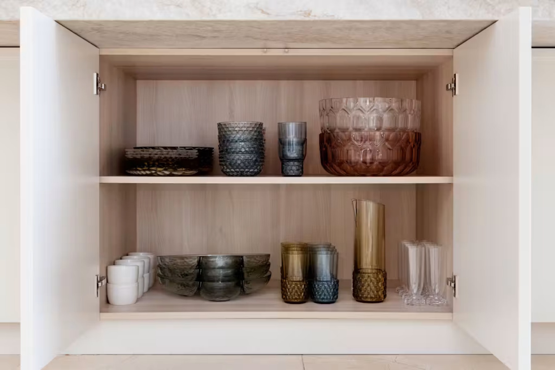 Split Pines — open display cabinet with glassware